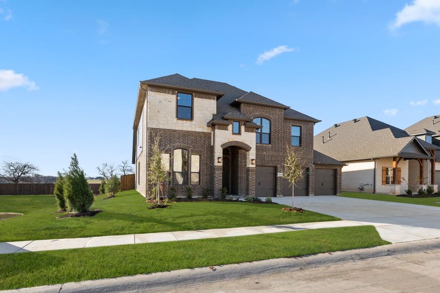 Representative exterior photo of a completed home built from the Fairview by Sandlin Homes in Lakesong, Midlothian, TX (Image 21). Representative exterior photo of a completed home built from the Fairview by Sandlin Homes in Lakesong, Midlothian, TX (Image 21).