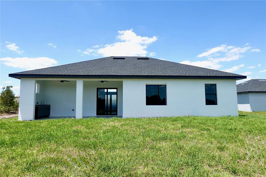 Exterior details and patio area of a home in , Lehigh Acres (Image 3). Exterior details and patio area of a home in , Lehigh Acres (Image 3).