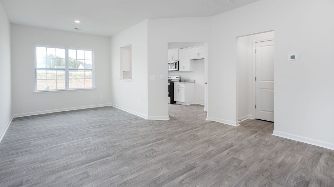 Spacious, unfurnished interior of a new home in The Gables at Edinborough Townes, Gibsonville (Image 11).