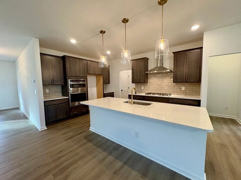 Kitchen featuring AW Collection® Oxford - Matte finishes, light wood, and refined style. Kitchen featuring AW Collection® Oxford - Matte finishes, light wood, and refined style.