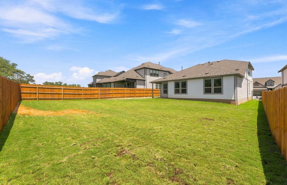 Exterior details and patio area of a home in Saddleback at Santa Rita Ranch, Liberty Hill (Image 26).