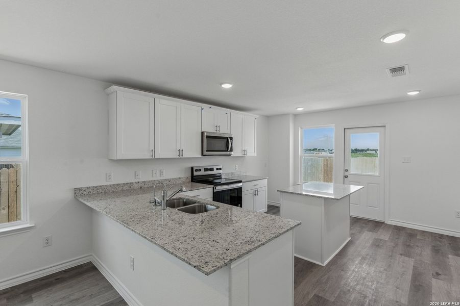 Furnished interior view inside a new home in Davis Ranch, San Antonio (Image 7).