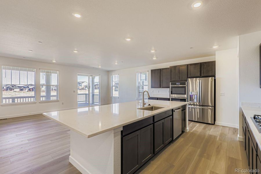 Furnished interior view inside a new home in Sunset Village: The Grand Collection, Erie (Image 6). Furnished interior view inside a new home in Sunset Village: The Grand Collection, Erie (Image 6).