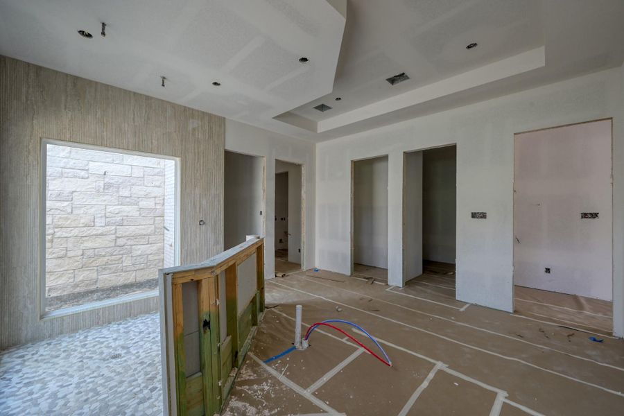 The primary spa-inspired bathroom has 2 private water closets with smart toilets for added privacy.  From the bathroom, you can also access the extra, locked storage room for additional security measures.