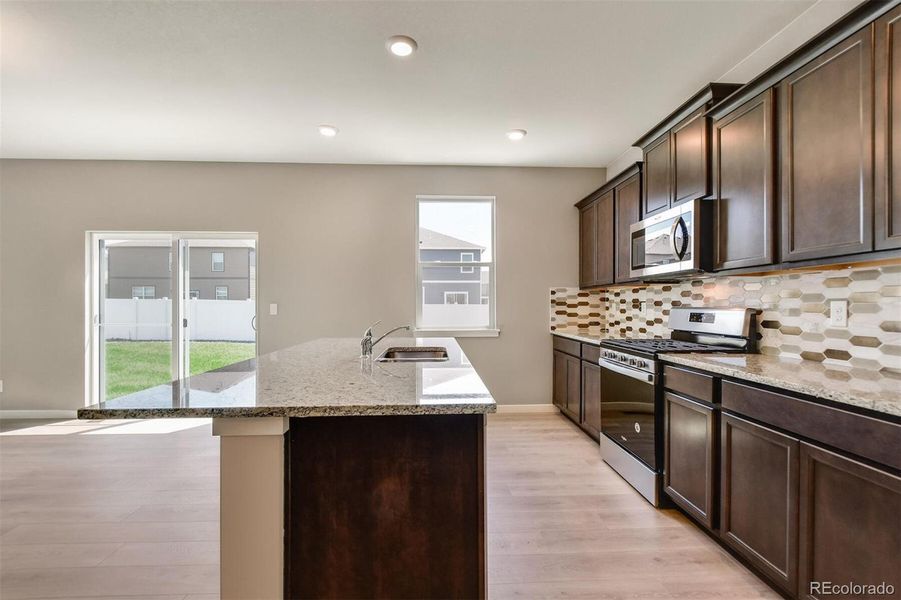 Furnished interior view inside a new home in Timberleaf, Thornton (Image 7).