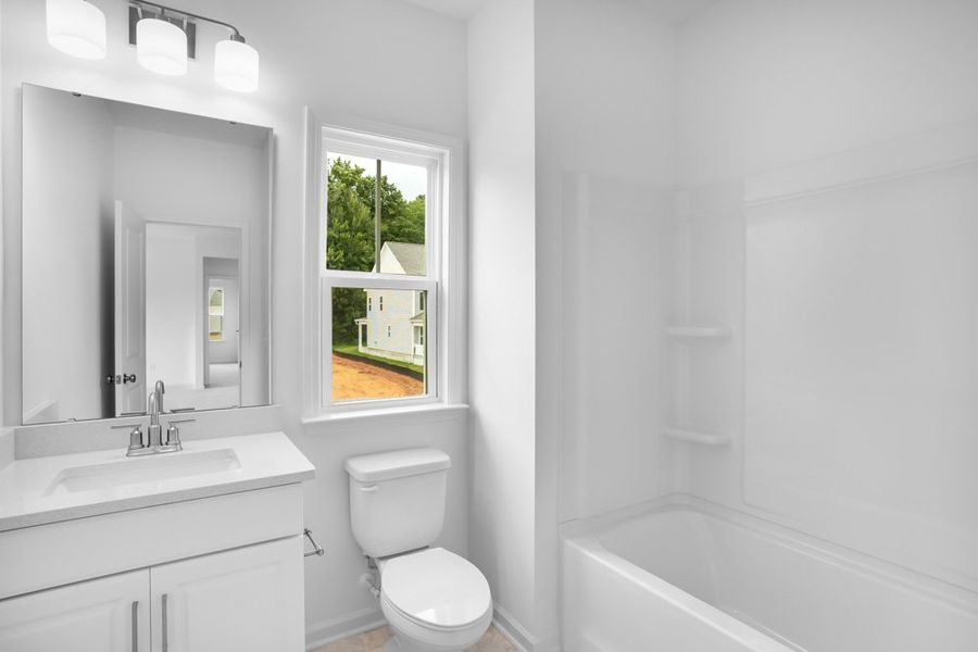 Representative furnished interior of a home built from the Leland by Taylor Morrison in Stafford at Langtree, Mooresville (Image 17).