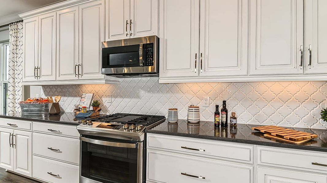 Furnished interior view inside a new home in Esplanade at Wiregrass Ranch, Wesley Chapel (Image 11).