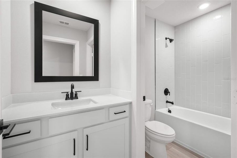 Furnished interior view inside a new home in Citrus Place, Babson Park (Image 9).