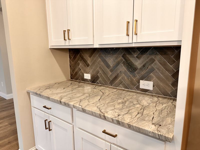 Furnished interior view inside a new home in The Reserve at Red Oaks, Carrollton (Image 10).