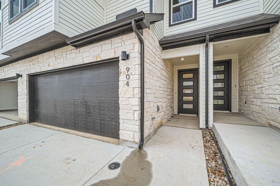 Exterior details and patio area of a home in Townhomes at Gattis, Round Rock (Image 3).