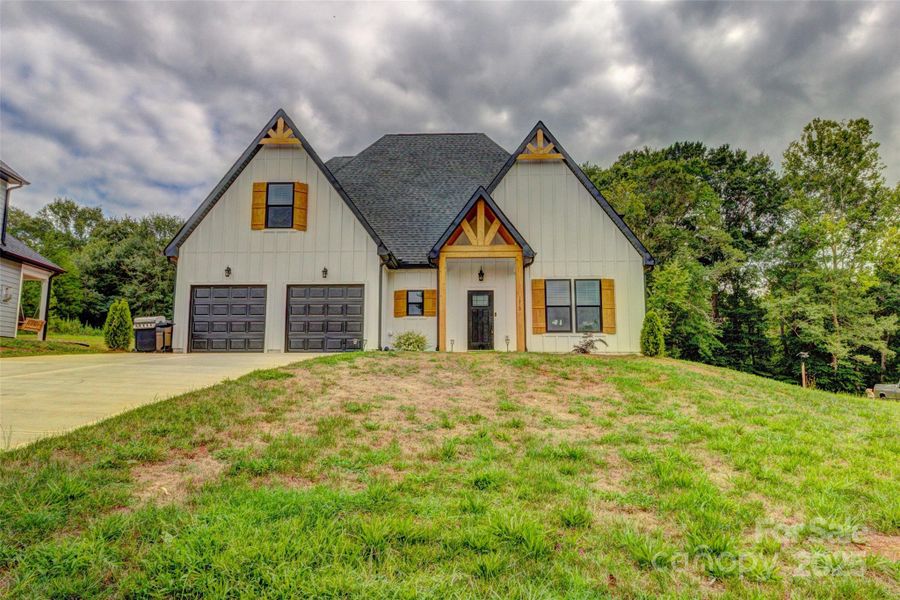 Front exterior of a new home in , Shelby, NC, highlighting curb appeal (Image 22). Front exterior of a new home in , Shelby, NC, highlighting curb appeal (Image 22).