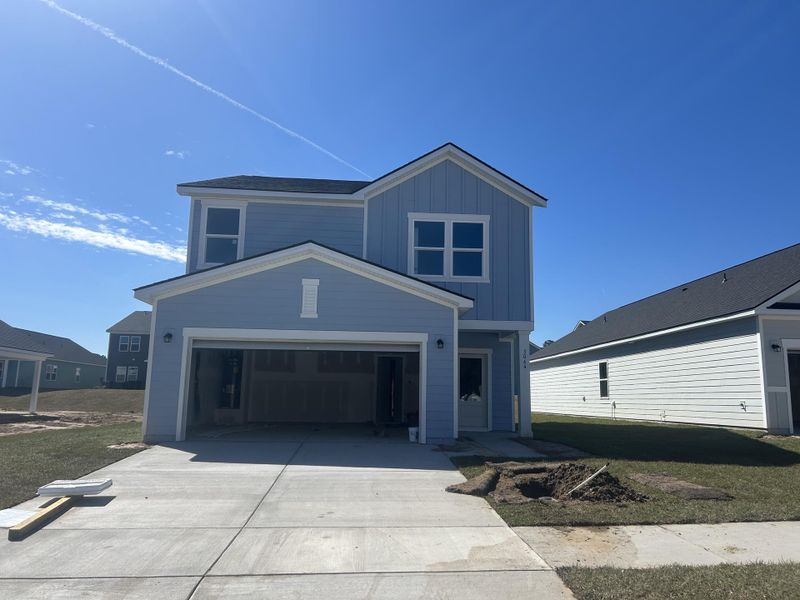 Front exterior of a new home in , Ravenel, SC, highlighting curb appeal (Image 8). Front exterior of a new home in , Ravenel, SC, highlighting curb appeal (Image 8).