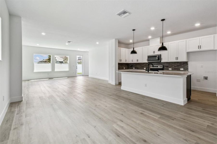 Spacious, unfurnished interior of a new home in The Peninsula at Rhodine Lake, Riverview (Image 18).
