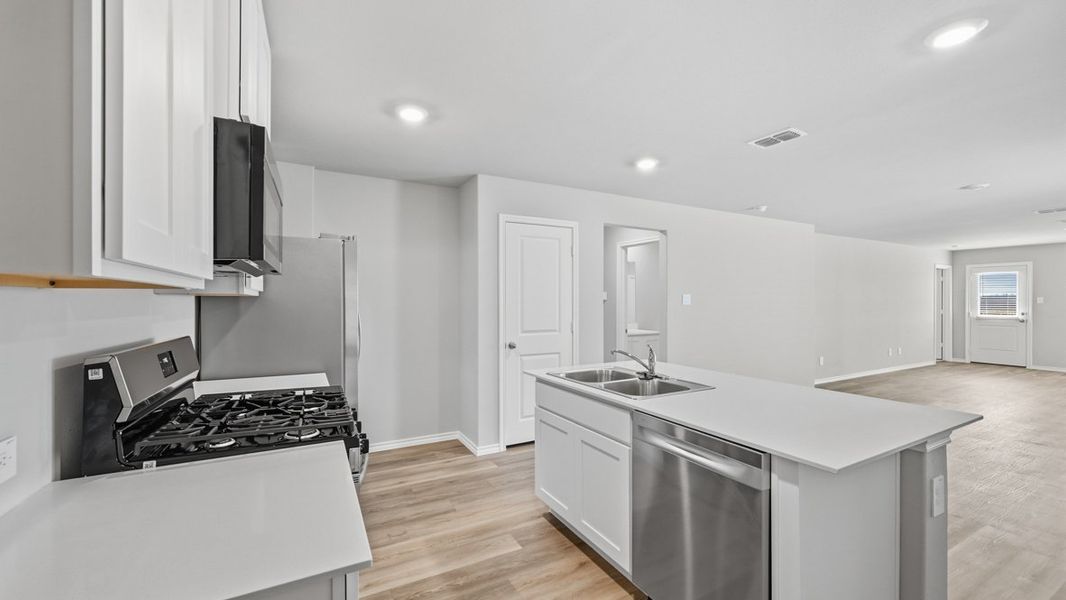 Representative furnished interior of a home built from the Caprock by D.R. Horton in Sunnycreek, Crowley (Image 7).