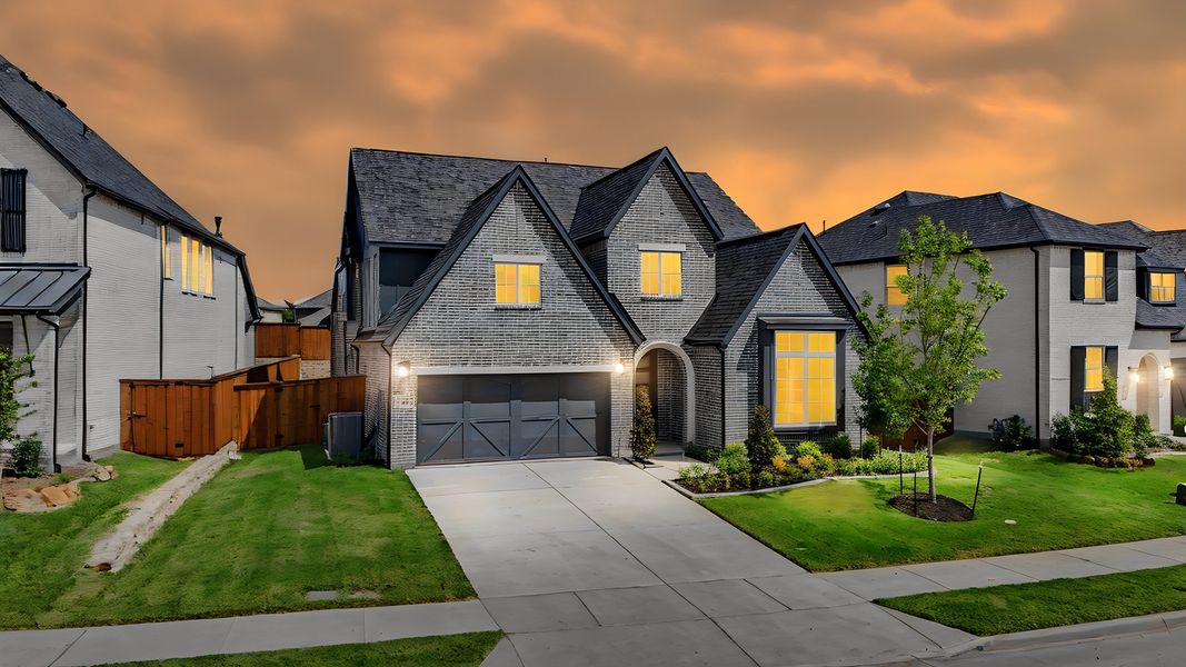 Front exterior of a new home in Aster Park, McKinney, TX, highlighting curb appeal (Image 24).