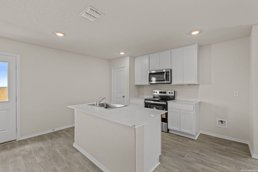 Furnished interior view inside a new home in Swenson Heights, Seguin (Image 9).