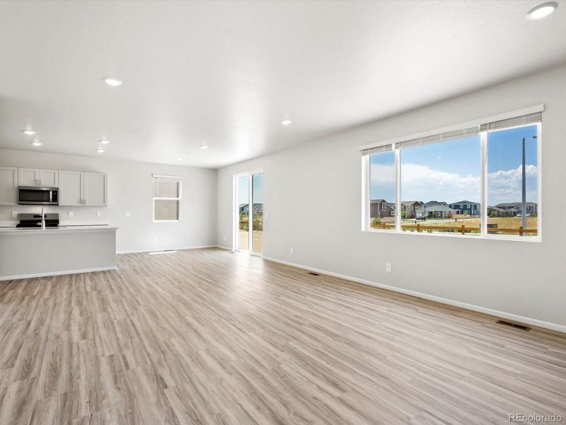 Spacious, unfurnished interior of a new home in Ridgeline Vista: The Canyon Collection, Brighton (Image 18).