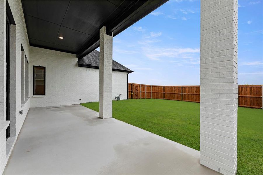 Front exterior of a new home in Talia, Mesquite, TX, highlighting curb appeal (Image 25). Front exterior of a new home in Talia, Mesquite, TX, highlighting curb appeal (Image 25).