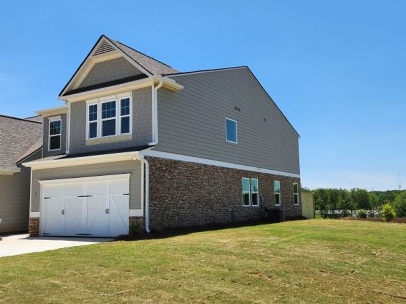Representative exterior photo of a completed home built from the Springdale Townhome by Piedmont Residential in The Retreat at Browns Ridge, Newnan, GA (Image 31).