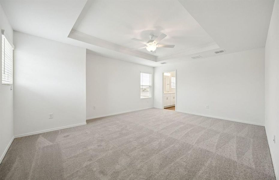 Spacious owner's suite with private bath