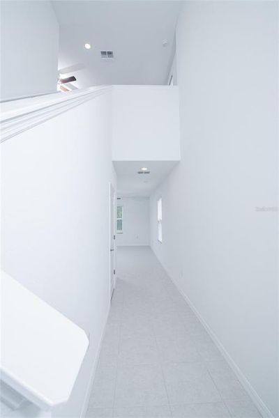 Spacious, unfurnished interior of a new home in Saddle Creek Preserve: The Manors II, Lakeland (Image 39).