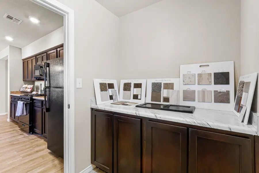 Furnished interior view inside a new home in Rancho Desierto Bello, Horizon City (Image 15).