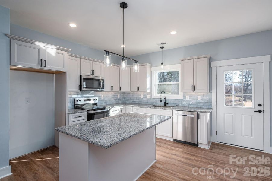 Furnished interior view inside a new home in , Hickory (Image 6).
