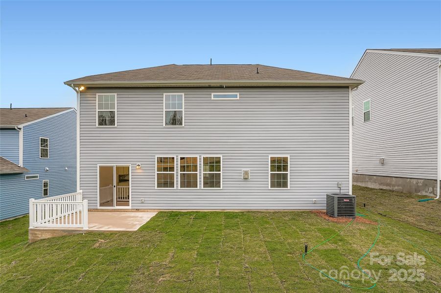 Exterior details and patio area of a home in Shannon Woods: Walk & Enclave, Maiden (Image 1).