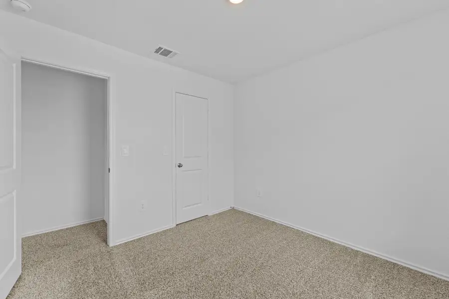 Spacious, unfurnished interior of a new home in Prairie Lakes, Buda (Image 24). Spacious, unfurnished interior of a new home in Prairie Lakes, Buda (Image 24).