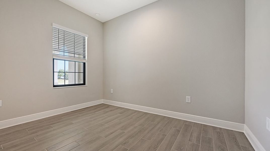 Spacious, unfurnished interior of a new home in Boca Royale Golf and Country Club at Wellen Park, Englewood (Image 33).