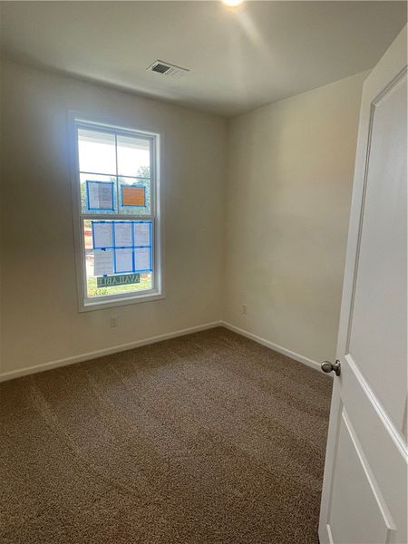 Spacious, unfurnished interior of a new home in Springwood Grove, Central (Image 31).