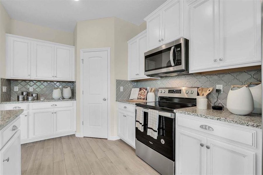 Furnished interior view inside a new home in Harmony West, St. Cloud (Image 52). Furnished interior view inside a new home in Harmony West, St. Cloud (Image 52).
