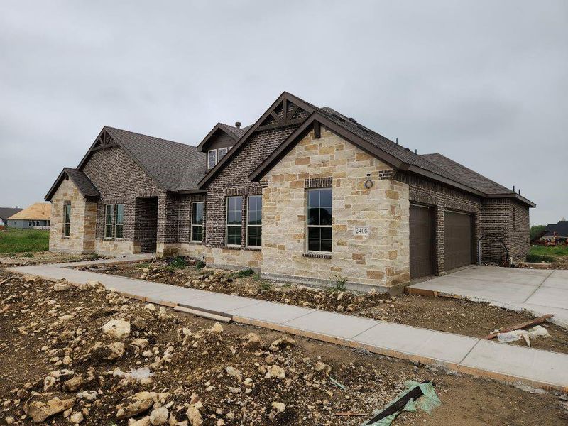 In-progress construction of a new home in Rocky Top, Krum, TX (Image 11).