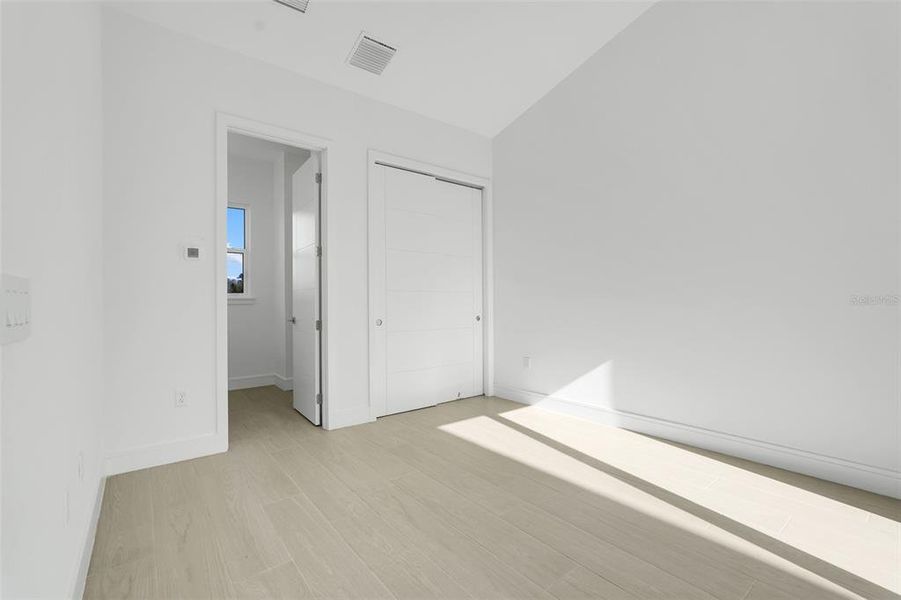 Spacious, unfurnished interior of a new home in Hampton Green at Providence, Davenport (Image 34).