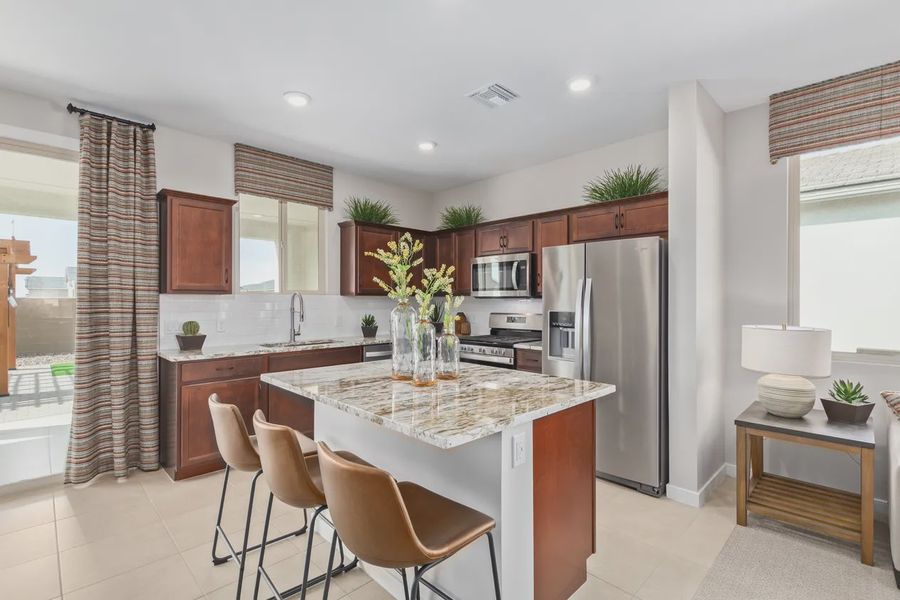 Representative furnished interior of a home built from the 1257 by Elliott Homes in Camilo at Santana, Yuma (Image 10).