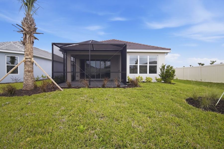 Exterior details and patio area of a home in Esplanade at Wiregrass Ranch, Wesley Chapel (Image 3).
