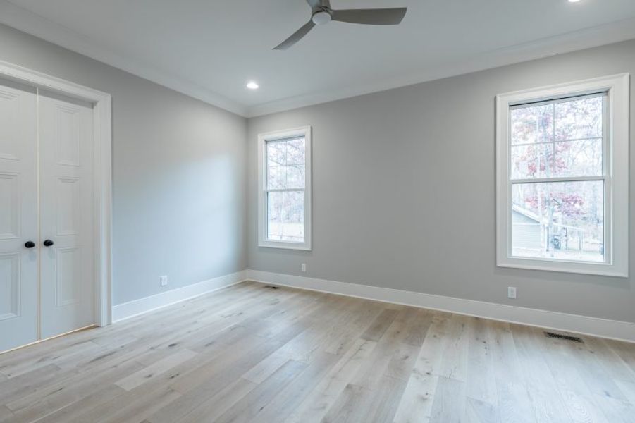 Representative unfurnished interior of a home built from the Carolina A by Riverstone Construction, LLC in Jasper Highlands, Guild (Image 39).