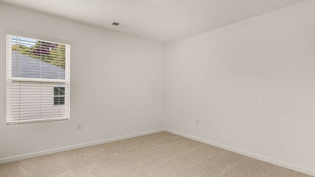 Representative unfurnished interior of a home built from the Dennis by D.R. Horton in Glenmaye, Hampton (Image 30).
