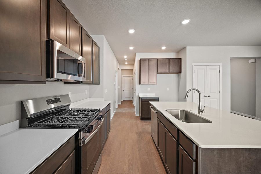 Furnished interior view inside a new home in Ridge at Lorson Ranch, Colorado Springs (Image 9).