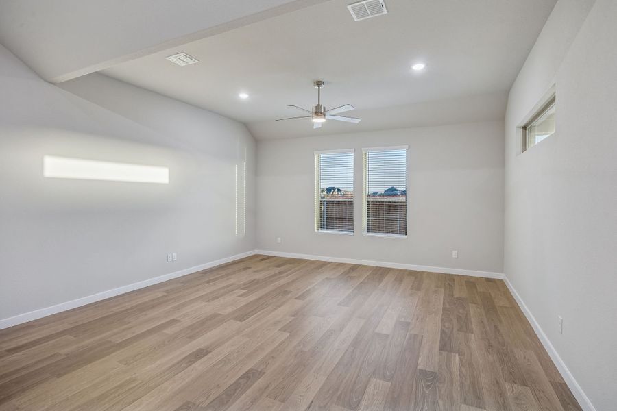 Living Room in the Wimbledon home plan by Trophy Signature Homes – REPRESENTATIVE PHOTO