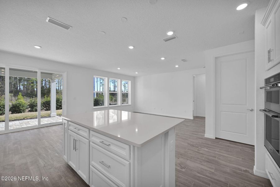 Furnished interior view inside a new home in Del Webb Wildlight, Yulee (Image 11).