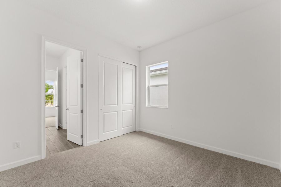 Spacious, unfurnished interior of a new home in Tradition - Telaro, Port St. Lucie (Image 9).