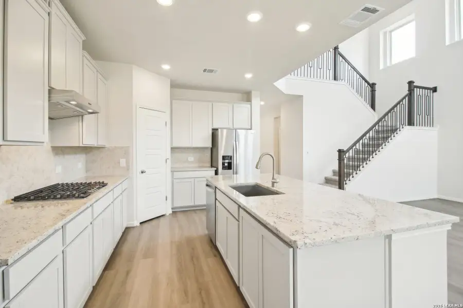 Furnished interior view inside a new home in , San Antonio (Image 12).