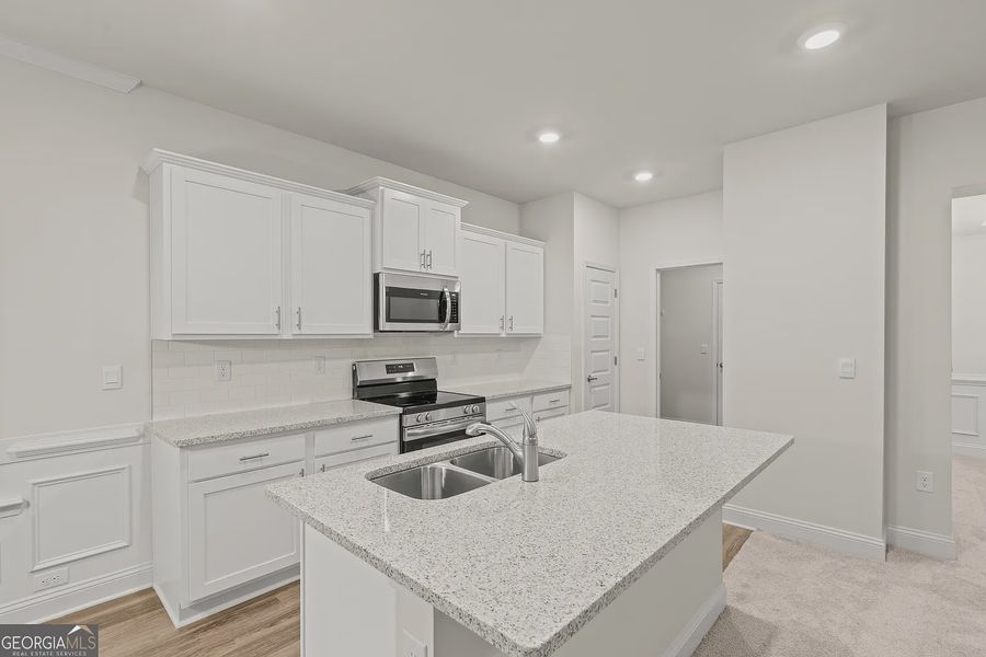 Furnished interior view inside a new home in Canterbury Villas, Carrollton (Image 4).