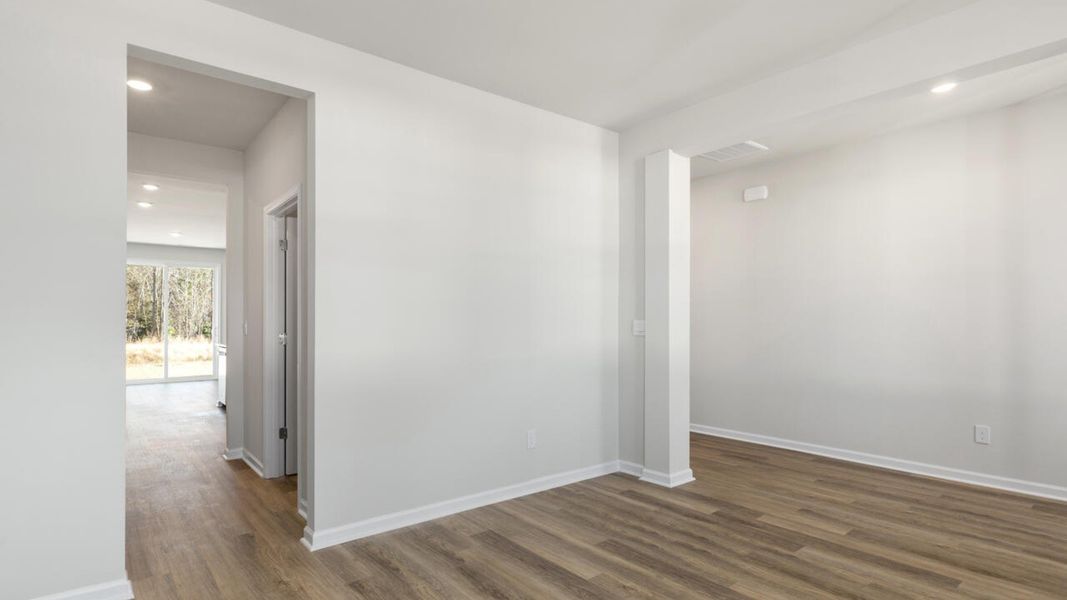 Representative unfurnished interior of a home built from the HARBOR OAK by D.R. Horton in Indigo Preserve, Leland (Image 20).