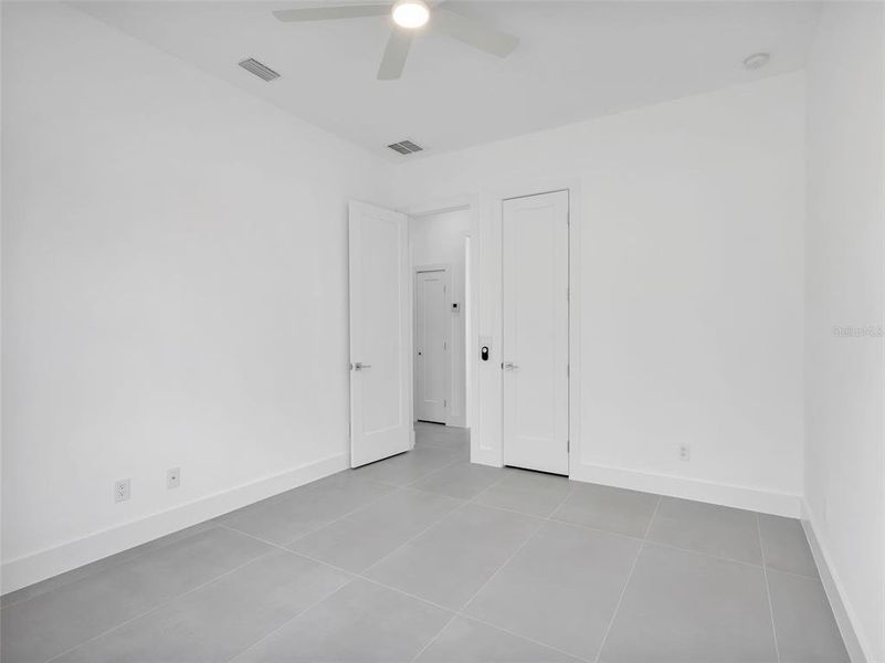 Spacious, unfurnished interior of a new home in , Port Charlotte (Image 37).