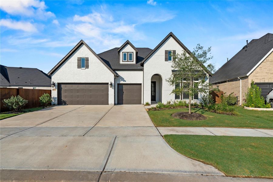 Front exterior of a new home in , Katy, TX, highlighting curb appeal (Image 1).