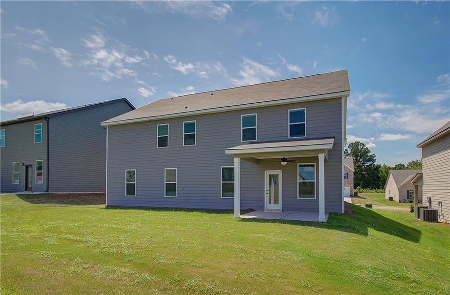 Exterior details and patio area of a home in Brighton, Locust Grove (Image 16).