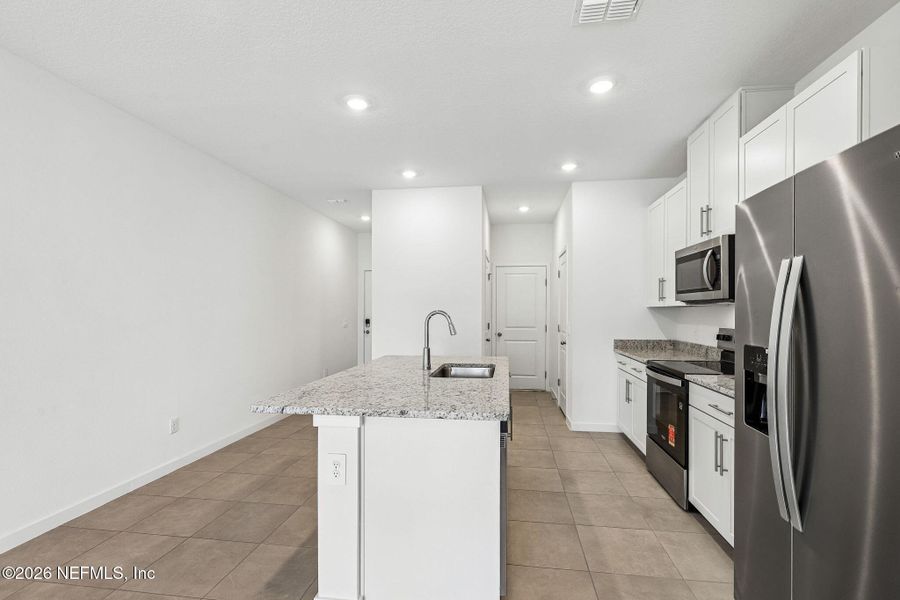 Furnished interior view inside a new home in The District at Oakleaf - The Commons, Middleburg (Image 7).