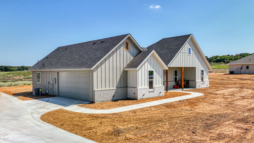 Representative exterior photo of a completed home built from the Loretta by Zeal Home Builders in Parallel Pastures, Poolville, TX (Image 25).